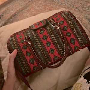 Banda bags nano crossbody bag